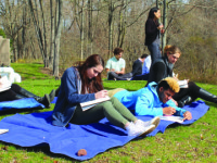 Students in the new environmental art class study, draw, and improve their surroundings