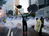 A  young demonstrator in Hong Kong protests Beijing’s involvement in Hong Kong elections.