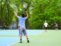 Boys’ Thirds Tennis players practice their stellar skills at an afternoon practice at the Hunt Tennis Center.