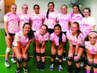 The Boars help raise money for breast cancer research through their charity Dig Pink match against Loomis.