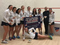 The Girls’ Squash Team poses after triumph in the Division II National Championships.