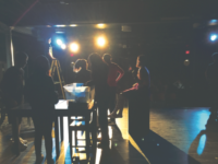 The cast of Fringe sets up props on stage during the tech rehearsal preceding the opening show. The show itself, entirely student- written, directed, and performed, was a success among audience members in all three showings.