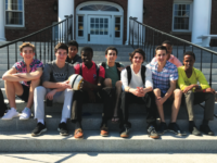 Members of Choate Soccer Club line up on the steps of Hill House.