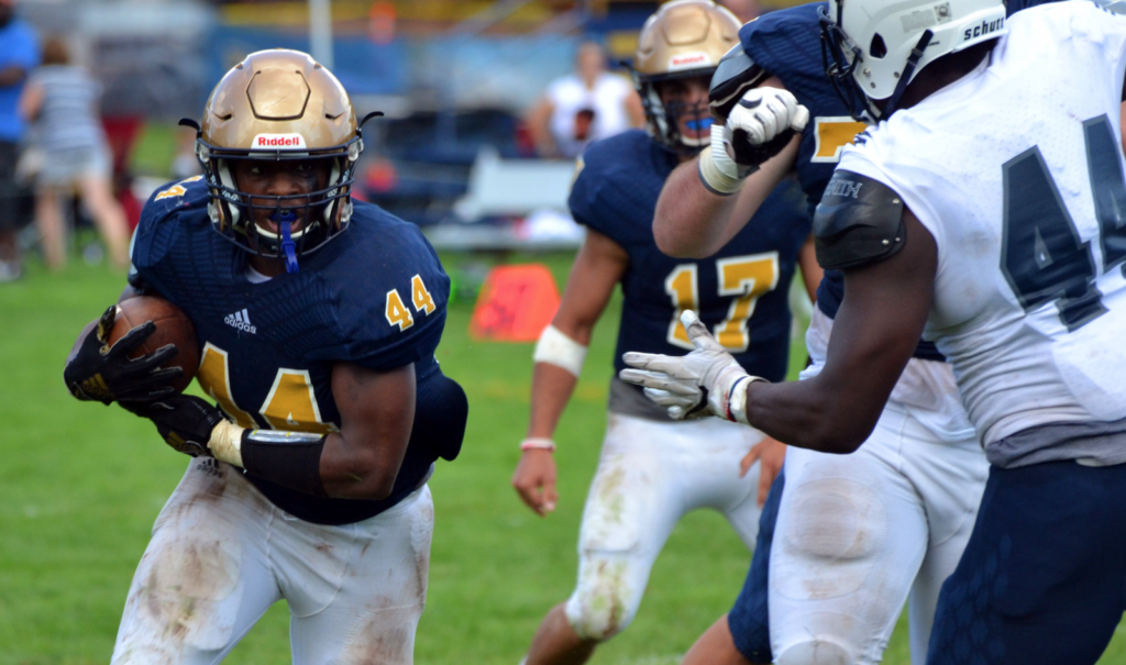 Rashaud Conway ’19 rushes for his first touchdown giving Choate a 14-6 lead in the second quarter. Photo courtesy of Pete Paguaga